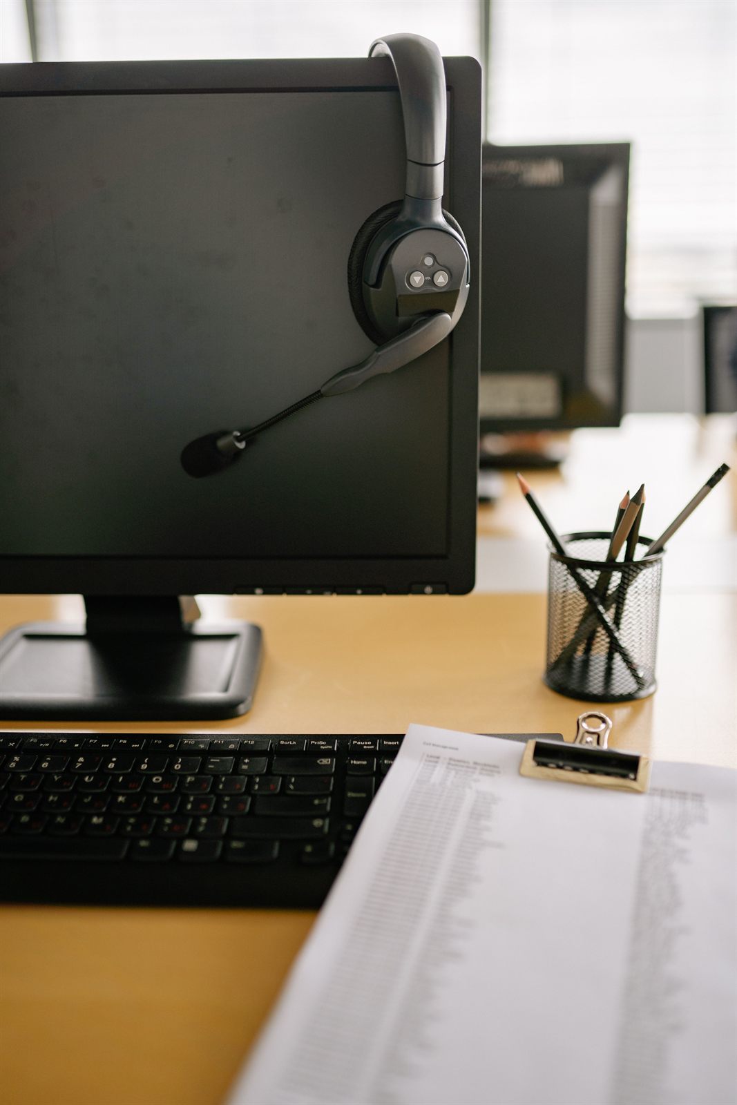 IT support professional helping with a computer